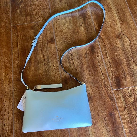 NWT Kate Spade Sadie Crossbody it’s in a “Crisp Sky” blue. It’s very light blue - Picture 2 of 11